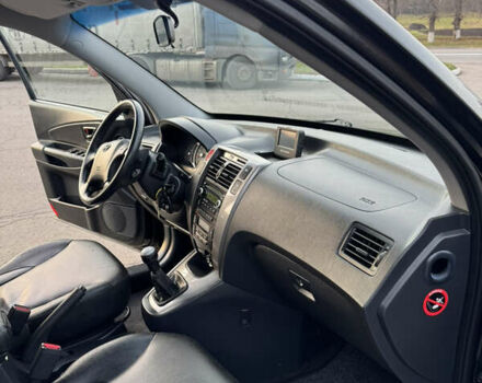 Черный Хендай Туксон, объемом двигателя 2 л и пробегом 210 тыс. км за 7850 $, фото 29 на Automoto.ua