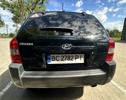 Чорний Хендай Туксон, об'ємом двигуна 1.98 л та пробігом 279 тис. км за 8200 $, фото 13 на Automoto.ua