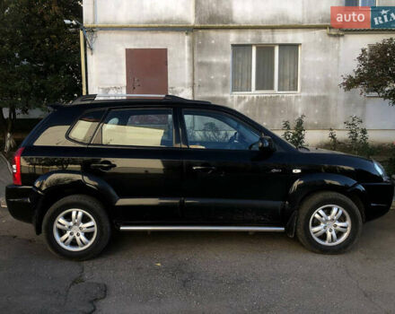 Черный Хендай Туксон, объемом двигателя 1.98 л и пробегом 256 тыс. км за 8200 $, фото 4 на Automoto.ua