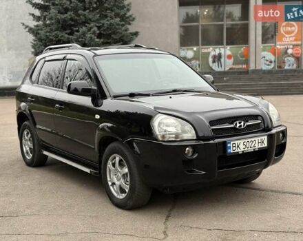 Черный Хендай Туксон, объемом двигателя 1.99 л и пробегом 240 тыс. км за 7200 $, фото 9 на Automoto.ua