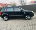 Черный Хендай Туксон, объемом двигателя 2 л и пробегом 276 тыс. км за 7450 $, фото 4 на Automoto.ua