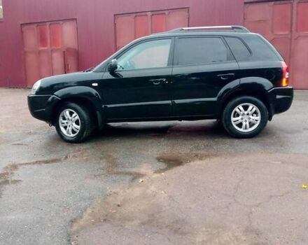 Чорний Хендай Туксон, об'ємом двигуна 2 л та пробігом 225 тис. км за 7850 $, фото 10 на Automoto.ua
