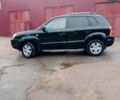 Чорний Хендай Туксон, об'ємом двигуна 2 л та пробігом 225 тис. км за 7850 $, фото 10 на Automoto.ua