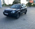 Черный Хендай Туксон, объемом двигателя 1.98 л и пробегом 250 тыс. км за 7200 $, фото 1 на Automoto.ua
