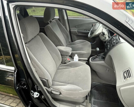 Черный Хендай Туксон, объемом двигателя 2 л и пробегом 107 тыс. км за 8900 $, фото 32 на Automoto.ua