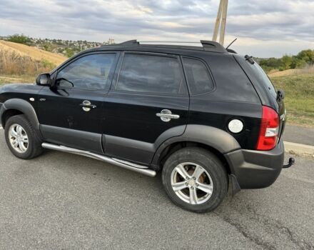 Чорний Хендай Туксон, об'ємом двигуна 2 л та пробігом 291 тис. км за 5400 $, фото 5 на Automoto.ua