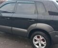 Черный Хендай Туксон, объемом двигателя 2 л и пробегом 200 тыс. км за 8300 $, фото 2 на Automoto.ua