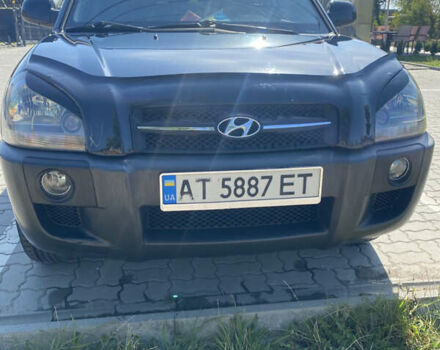 Черный Хендай Туксон, объемом двигателя 1.98 л и пробегом 254 тыс. км за 7700 $, фото 1 на Automoto.ua