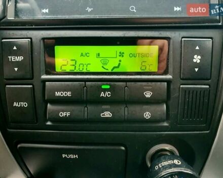 Чорний Хендай Туксон, об'ємом двигуна 2 л та пробігом 225 тис. км за 8000 $, фото 55 на Automoto.ua