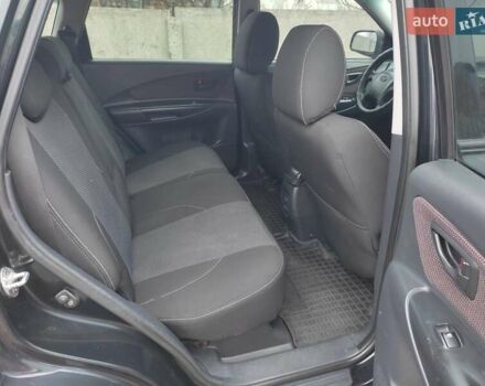 Черный Хендай Туксон, объемом двигателя 2 л и пробегом 237 тыс. км за 7500 $, фото 12 на Automoto.ua