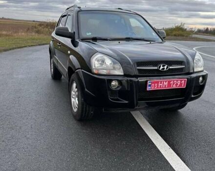 Черный Хендай Туксон, объемом двигателя 2 л и пробегом 253 тыс. км за 8299 $, фото 1 на Automoto.ua