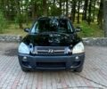 Чорний Хендай Туксон, об'ємом двигуна 2 л та пробігом 267 тис. км за 8200 $, фото 1 на Automoto.ua