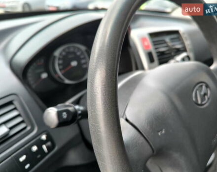 Черный Хендай Туксон, объемом двигателя 2 л и пробегом 137 тыс. км за 8400 $, фото 20 на Automoto.ua