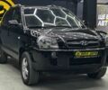 Черный Хендай Туксон, объемом двигателя 2 л и пробегом 224 тыс. км за 7800 $, фото 1 на Automoto.ua