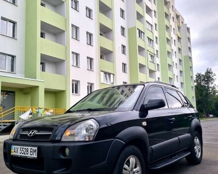 Черный Хендай Туксон, объемом двигателя 2 л и пробегом 152 тыс. км за 7800 $, фото 5 на Automoto.ua