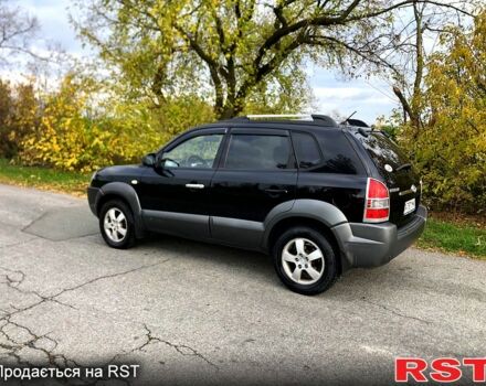 Черный Хендай Туксон, объемом двигателя 2 л и пробегом 220 тыс. км за 8000 $, фото 3 на Automoto.ua