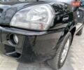 Черный Хендай Туксон, объемом двигателя 2 л и пробегом 137 тыс. км за 8400 $, фото 15 на Automoto.ua