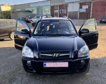 Черный Хендай Туксон, объемом двигателя 2 л и пробегом 215 тыс. км за 7900 $, фото 30 на Automoto.ua