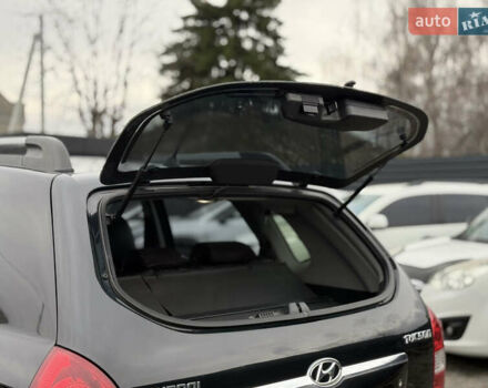 Черный Хендай Туксон, объемом двигателя 2 л и пробегом 252 тыс. км за 7200 $, фото 19 на Automoto.ua