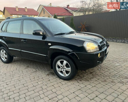 Черный Хендай Туксон, объемом двигателя 2 л и пробегом 276 тыс. км за 7450 $, фото 22 на Automoto.ua