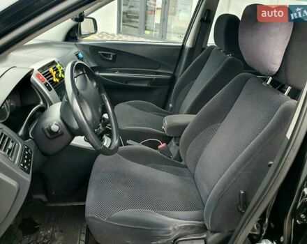 Чорний Хендай Туксон, об'ємом двигуна 2 л та пробігом 225 тис. км за 8000 $, фото 40 на Automoto.ua