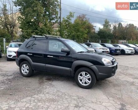 Черный Хендай Туксон, объемом двигателя 2 л и пробегом 117 тыс. км за 7990 $, фото 1 на Automoto.ua