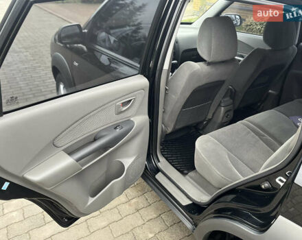 Черный Хендай Туксон, объемом двигателя 2 л и пробегом 107 тыс. км за 8900 $, фото 25 на Automoto.ua