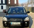 Черный Хендай Туксон, объемом двигателя 2 л и пробегом 225 тыс. км за 8200 $, фото 1 на Automoto.ua