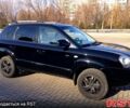 Черный Хендай Туксон, объемом двигателя 2 л и пробегом 240 тыс. км за 8000 $, фото 2 на Automoto.ua