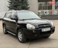 Черный Хендай Туксон, объемом двигателя 1.99 л и пробегом 240 тыс. км за 7200 $, фото 10 на Automoto.ua