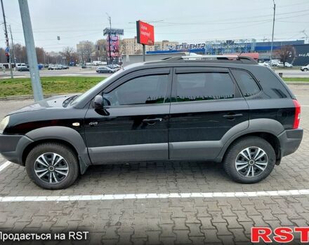 Чорний Хендай Туксон, об'ємом двигуна 2 л та пробігом 106 тис. км за 8350 $, фото 3 на Automoto.ua