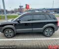 Чорний Хендай Туксон, об'ємом двигуна 2 л та пробігом 106 тис. км за 8350 $, фото 3 на Automoto.ua