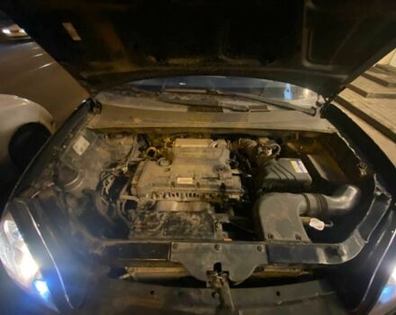 Черный Хендай Туксон, объемом двигателя 2 л и пробегом 136 тыс. км за 2500 $, фото 8 на Automoto.ua