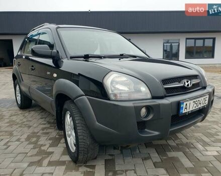 Чорний Хендай Туксон, об'ємом двигуна 2 л та пробігом 225 тис. км за 8000 $, фото 12 на Automoto.ua