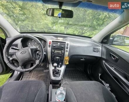 Чорний Хендай Туксон, об'ємом двигуна 1.99 л та пробігом 288 тис. км за 8000 $, фото 11 на Automoto.ua