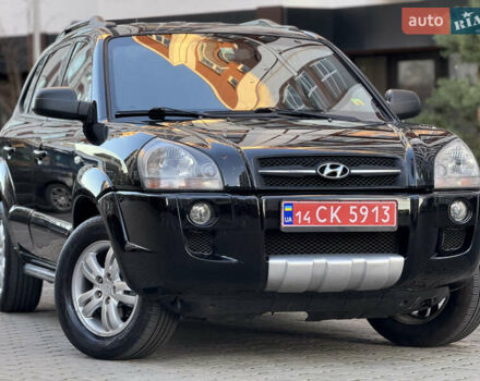 Чорний Хендай Туксон, об'ємом двигуна 2 л та пробігом 156 тис. км за 7850 $, фото 13 на Automoto.ua