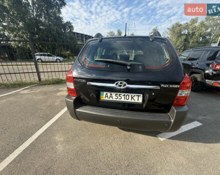 Черный Хендай Туксон, объемом двигателя 2 л и пробегом 218 тыс. км за 6700 $, фото 2 на Automoto.ua