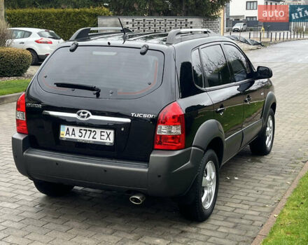 Черный Хендай Туксон, объемом двигателя 2 л и пробегом 107 тыс. км за 8900 $, фото 9 на Automoto.ua