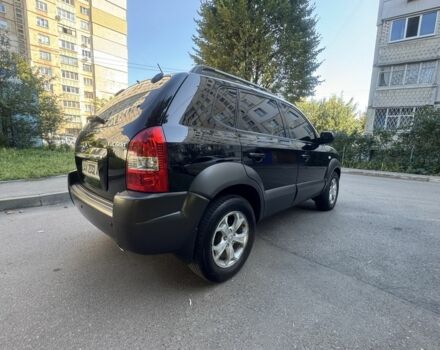 Черный Хендай Туксон, объемом двигателя 2 л и пробегом 228 тыс. км за 7950 $, фото 7 на Automoto.ua