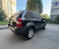 Черный Хендай Туксон, объемом двигателя 2 л и пробегом 228 тыс. км за 7950 $, фото 7 на Automoto.ua