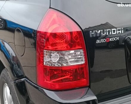 Чорний Хендай Туксон, об'ємом двигуна 2 л та пробігом 192 тис. км за 7990 $, фото 9 на Automoto.ua