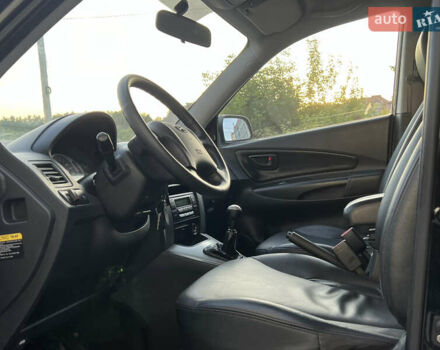 Чорний Хендай Туксон, об'ємом двигуна 1.98 л та пробігом 185 тис. км за 7199 $, фото 40 на Automoto.ua