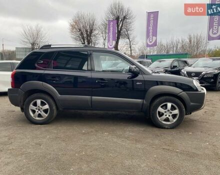 Чорний Хендай Туксон, об'ємом двигуна 1.98 л та пробігом 176 тис. км за 8500 $, фото 3 на Automoto.ua