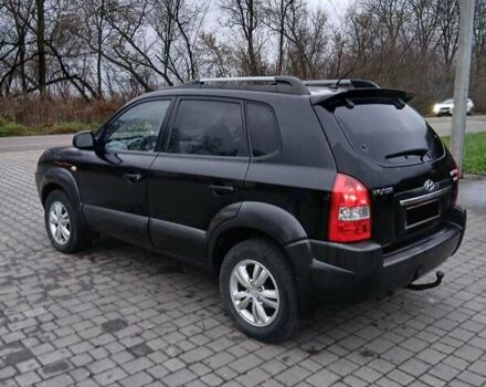 Черный Хендай Туксон, объемом двигателя 2 л и пробегом 230 тыс. км за 8000 $, фото 14 на Automoto.ua