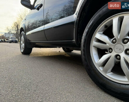 Черный Хендай Туксон, объемом двигателя 1.98 л и пробегом 196 тыс. км за 7999 $, фото 20 на Automoto.ua