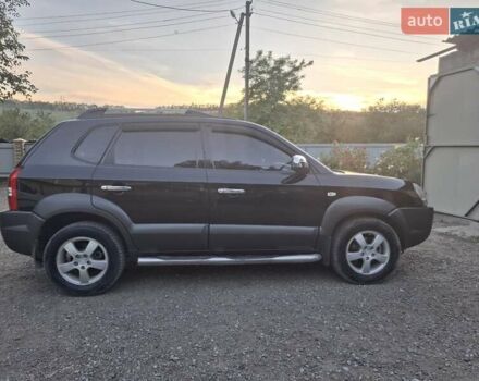 Черный Хендай Туксон, объемом двигателя 2 л и пробегом 197 тыс. км за 8000 $, фото 8 на Automoto.ua