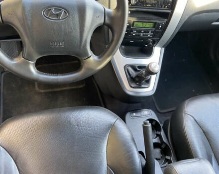 Хендай Туксон 2008 у Рівному на Automoto.ua Чорний Хендай Туксон, об'ємом двигуна 2 л та пробігом 165 тис. км за 7800 $, фото 10 на Automoto.ua