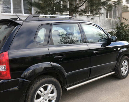 Черный Хендай Туксон, объемом двигателя 1.98 л и пробегом 256 тыс. км за 8200 $, фото 3 на Automoto.ua