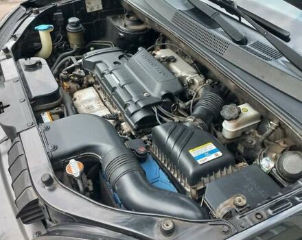 Черный Хендай Туксон, объемом двигателя 2 л и пробегом 168 тыс. км за 9000 $, фото 20 на Automoto.ua