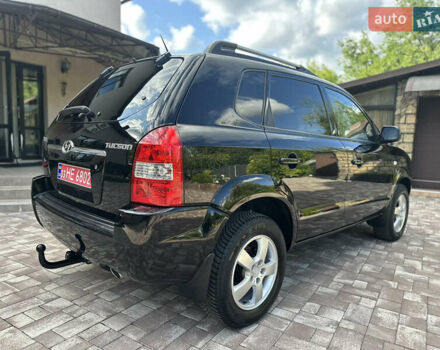 Черный Хендай Туксон, объемом двигателя 2 л и пробегом 218 тыс. км за 8700 $, фото 8 на Automoto.ua